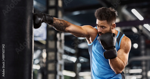 Photos Young sportsman boxing workout at gym, guy punching boxing bag, free space