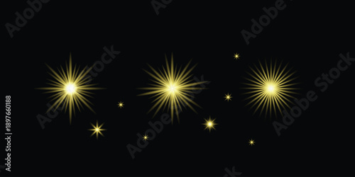 Sparkling fireworks exploding in the night sky with bright yellow lights