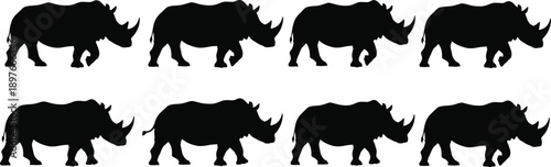 Rhino silhouette collection showing black rhinoceros shapes in walking poses, perfect for wildlife logos, safari designs, conservation graphics, and vector illustration projects