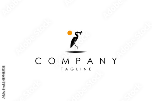 Stork bird logo eating fish in sunlight in vector silhouette design style