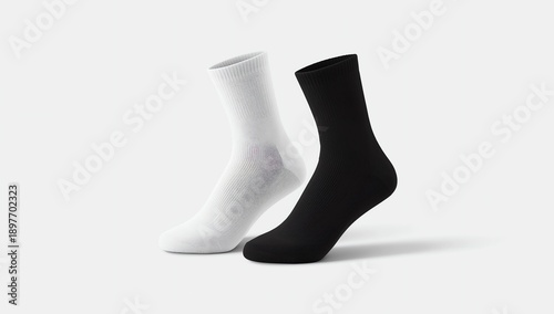 Blank black and white long socks mockup stand, half-turned view 