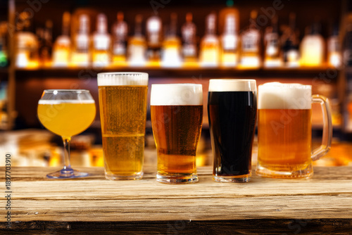 Принти на полотні Assorted beer glasses lined up on a bar counter
Beer tasting selection with diff