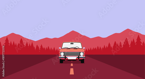 Vintage car driving on a scenic red road through mountains.