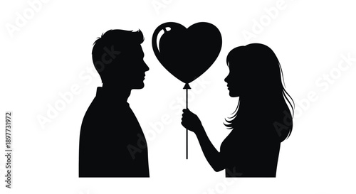 Couple sharing a loving moment with a heart shaped balloon silhouette