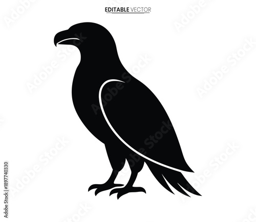 Billede på lærred A striking silhouette of a majestic eagle perched showcasing its powerful form a