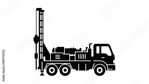 Large truck with drilling equipment attached.