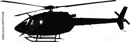Silhouette of a helicopter in flight against a plain background