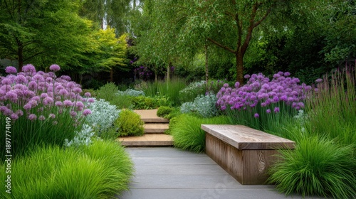 Wallpaper Mural Serene Garden Pathway Surrounded by Lush Greenery and Vibrant Purple Flowers in a Tranquil Outdoor Space Perfect for Relaxation and Reflection Torontodigital.ca