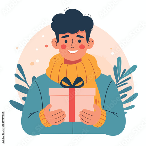 Man holding gift box with ribbon, smiling, surrounded by leaves, in a casual environment from a front viewpoint