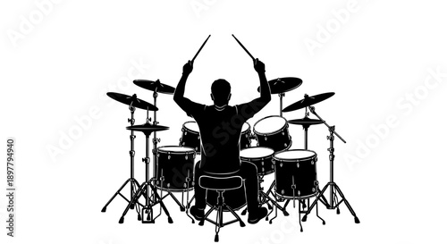 Silhouette of a Drummer Playing a Drum Kit with Excitement in a Studio Setting from a Rear Viewpoint