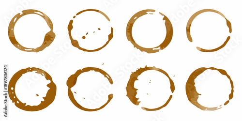 Coffee ring stains arranged in a grid pattern on a white background