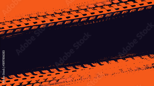 Orange tire tracks on a dark background creating a dynamic pattern