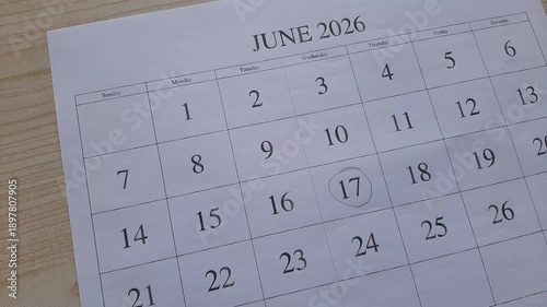 marking 17 June 2026 date on the calendar
