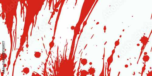 Abstract red splatters and droplets on a clean white background
