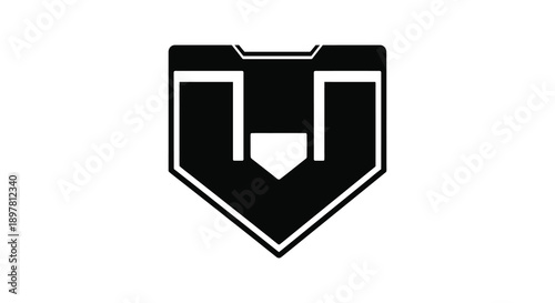 A stark black and white image depicts a shield shaped emblem with a central inverted u shape high quality professional