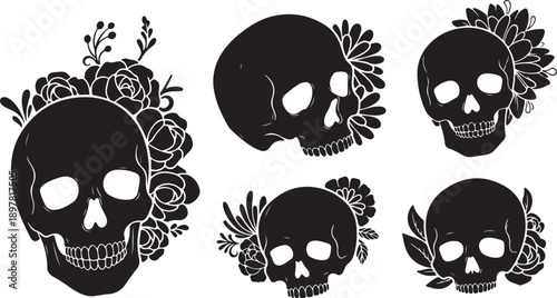 Black skulls with floral designs on white background illustration