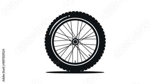 A single mountain bike wheel with a durable knobby tire and visible spokes embodies outdoor adventure, ideal for sports marketing and cycling event promotions.