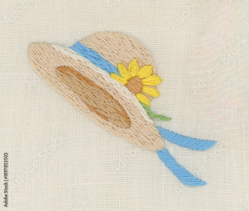 ひまわりの花と水色のリボンがついた麦わら帽子の刺繍