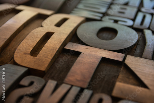 Wooden letterpress printing blocks in closeup
