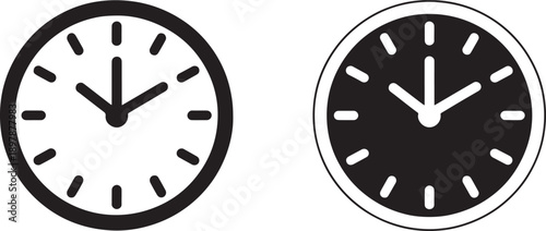 Black and white clock faces with hands
