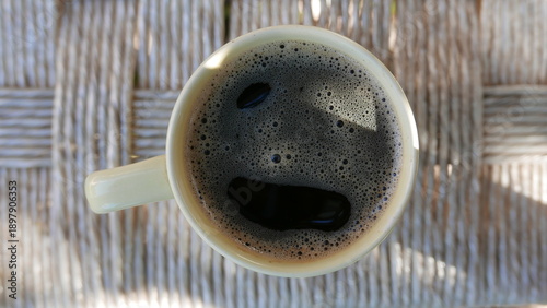 Quadro em tela A hot cup of coffee on the table