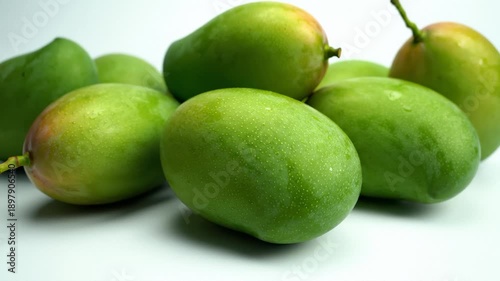 Wallpaper Mural Close Up of Fresh Green Mangoes Piled Together on White Background Torontodigital.ca
