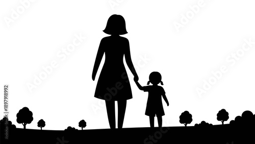 Silhouette of mother and child walking.