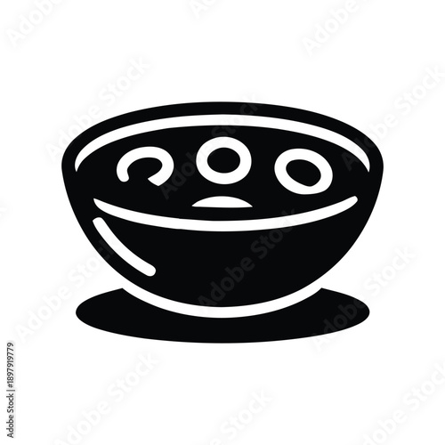 A whimsical bowl of food with a face that appears to be alive and expressive