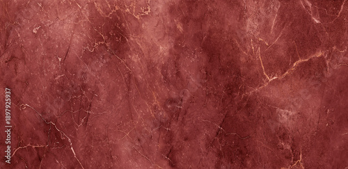 Photos Deep red marble background with dramatic veins and bold natural stone texture