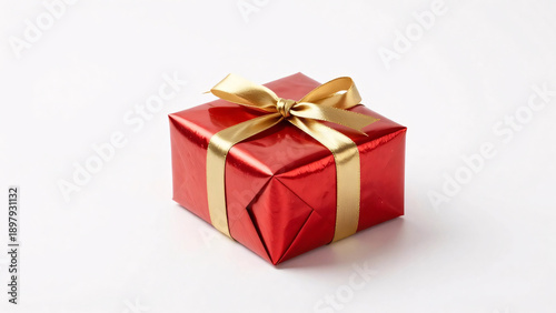 A festive red square gift box wrapped with a luxurious gold ribbon and bow sits on a clean white background, perfect for holiday or celebration mockups.