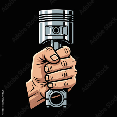 Hand holding a piston engine part.