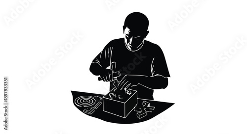 Focused person meticulously assembling a small object with tools