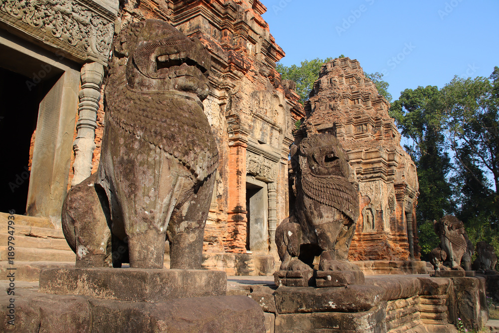 Naklejka premium ruined ancient hindu and buddhist khmer temple (preah ko) in angkor in siem reap in cambodia 