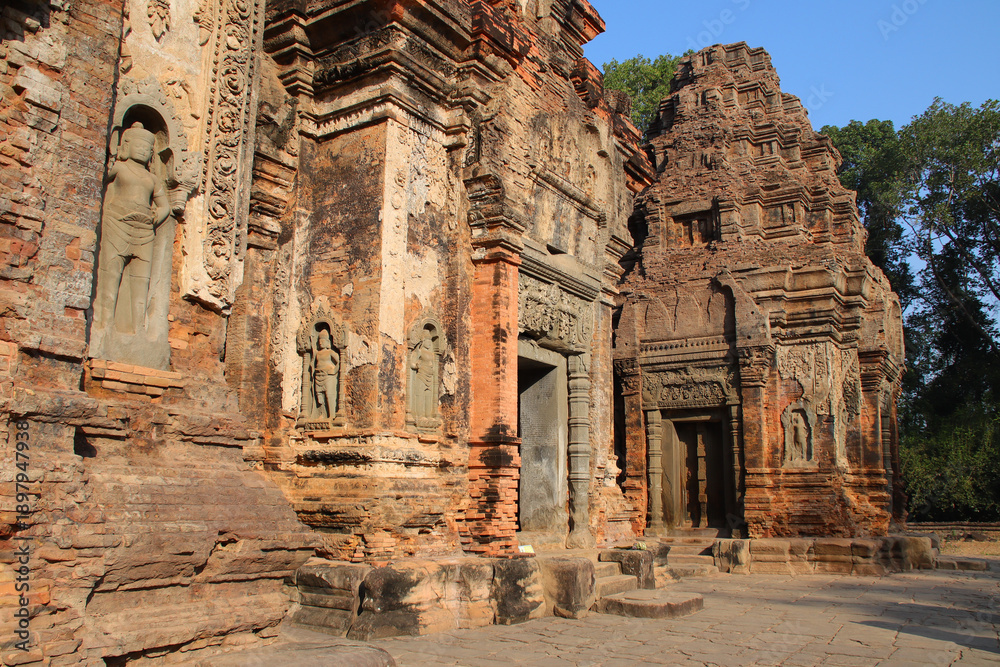 Naklejka premium ruined ancient hindu and buddhist khmer temple (preah ko) in angkor in siem reap in cambodia 