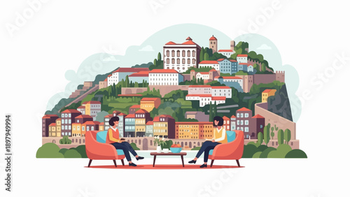 Two people converse in chairs overlooking a picturesque hillside town