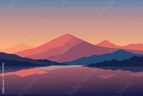 Misty mountain landscape with glowing sunset sky over forested hills and valley horizon