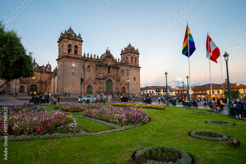 Main Square Plaza de Armas and Church of the Society of Jesus in Cusco, Peru, at golden hour