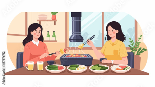 Two smiling women enjoying a tabletop barbecue with grilled food and side dishes