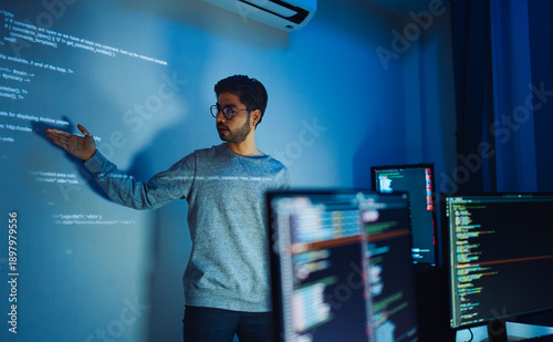 Programmer giving a Presentation using a Projector to show Code for Software Development and Technology Innovation with Artificial Intelligence