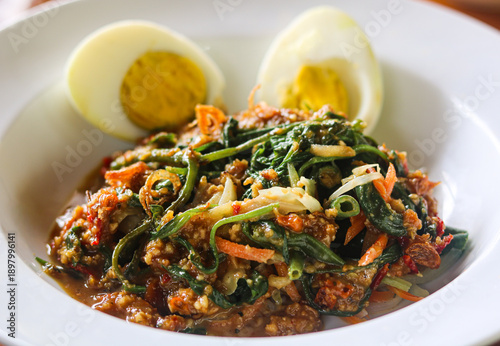 Canvas Print Pecel, a traditional salad consisting of various blanched vegetables generously smothered in a thick, savory-sweet peanut sauce