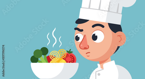 Chef intently smelling delicious food in a bowl with vegetables and pasta