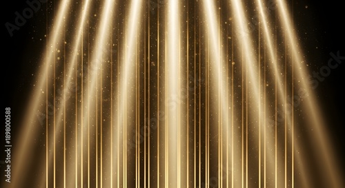 Golden light beams shine down on dark background with sparkling dust particles