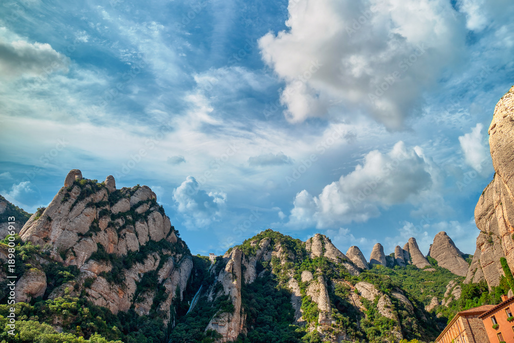 Fototapeta premium The monastery of Santa Maria de Montserrat is a Benedictine abbey located on the Montserrat mountain, belonging to the Bages region, province of Barcelona, ​​Spain.