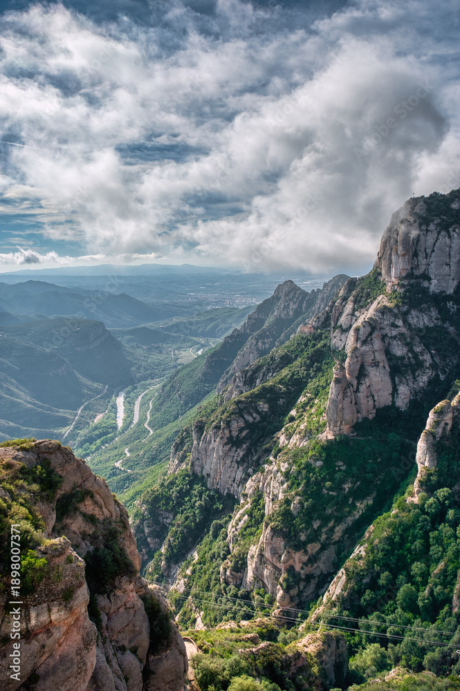 Fototapeta premium The monastery of Santa Maria de Montserrat is a Benedictine abbey located on the Montserrat mountain, belonging to the Bages region, province of Barcelona, ​​Spain.