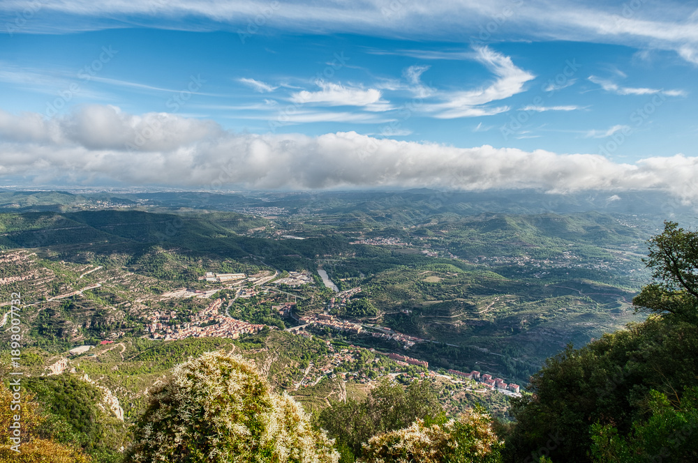 Obraz premium The monastery of Santa Maria de Montserrat is a Benedictine abbey located on the Montserrat mountain, belonging to the Bages region, province of Barcelona, ​​Spain.