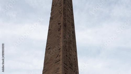 tall egyptian obelisk with heiroglyphics in central park manhattan new york city (historic antique monument from ancient egypt) art history relic thousands years old museum mile metropolitan