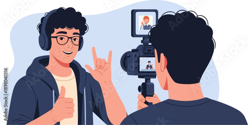 Person with headphones records a person filming with a camera