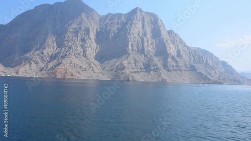 Aerial View of Musandam Peninsula Fjords at the Strategic Strait of Hormuz. overlooking the narrowest point of the Strait of Hormuz. This 
