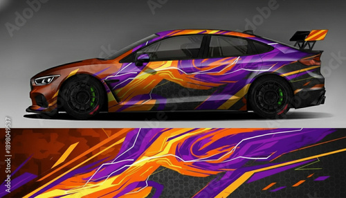 A sports car with a vibrant purple and orange abstract graphic wrap design.