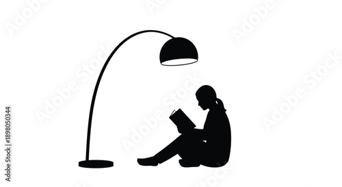 Silhouette of a person reading under an arched floor lamp